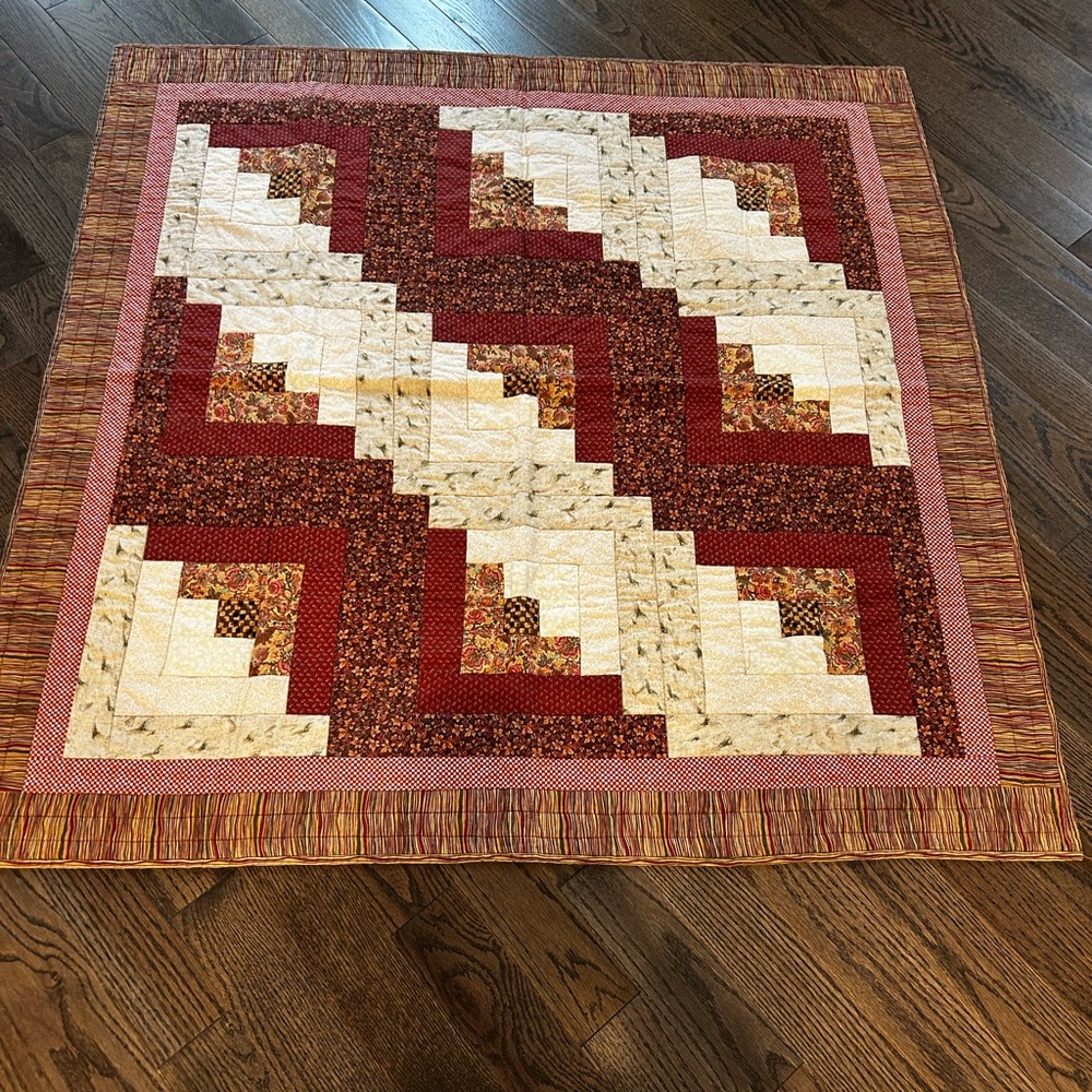 Elegant Handmade Patchwork Quilt in warm dark tones